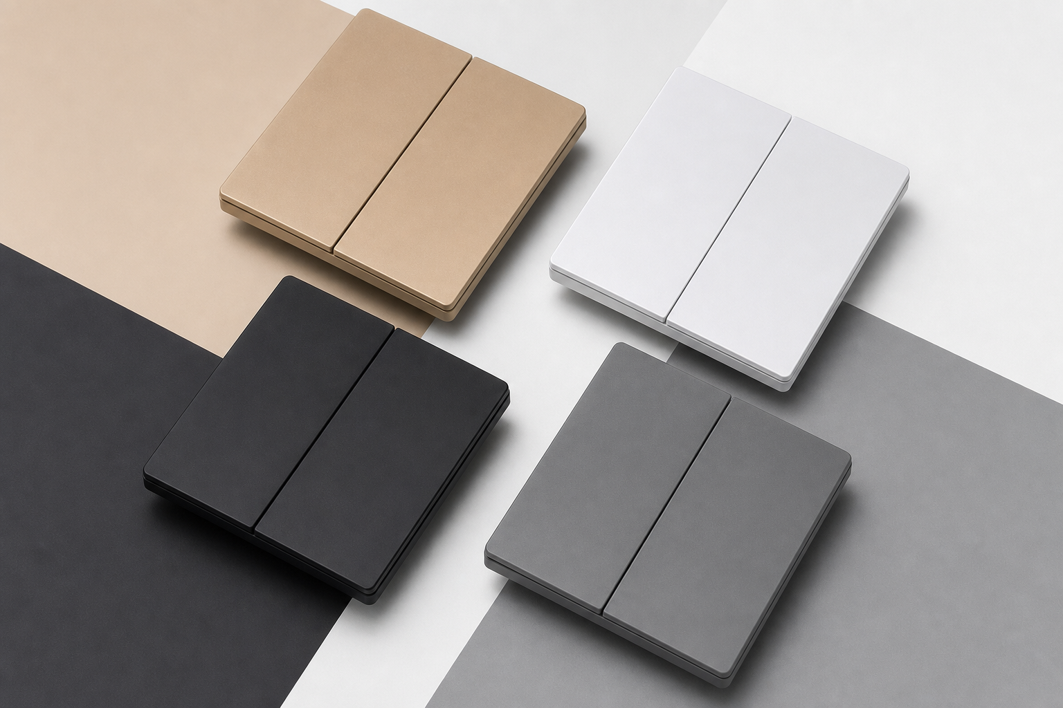 Four Quattro switches in matte champagne, white, black and grey finishes